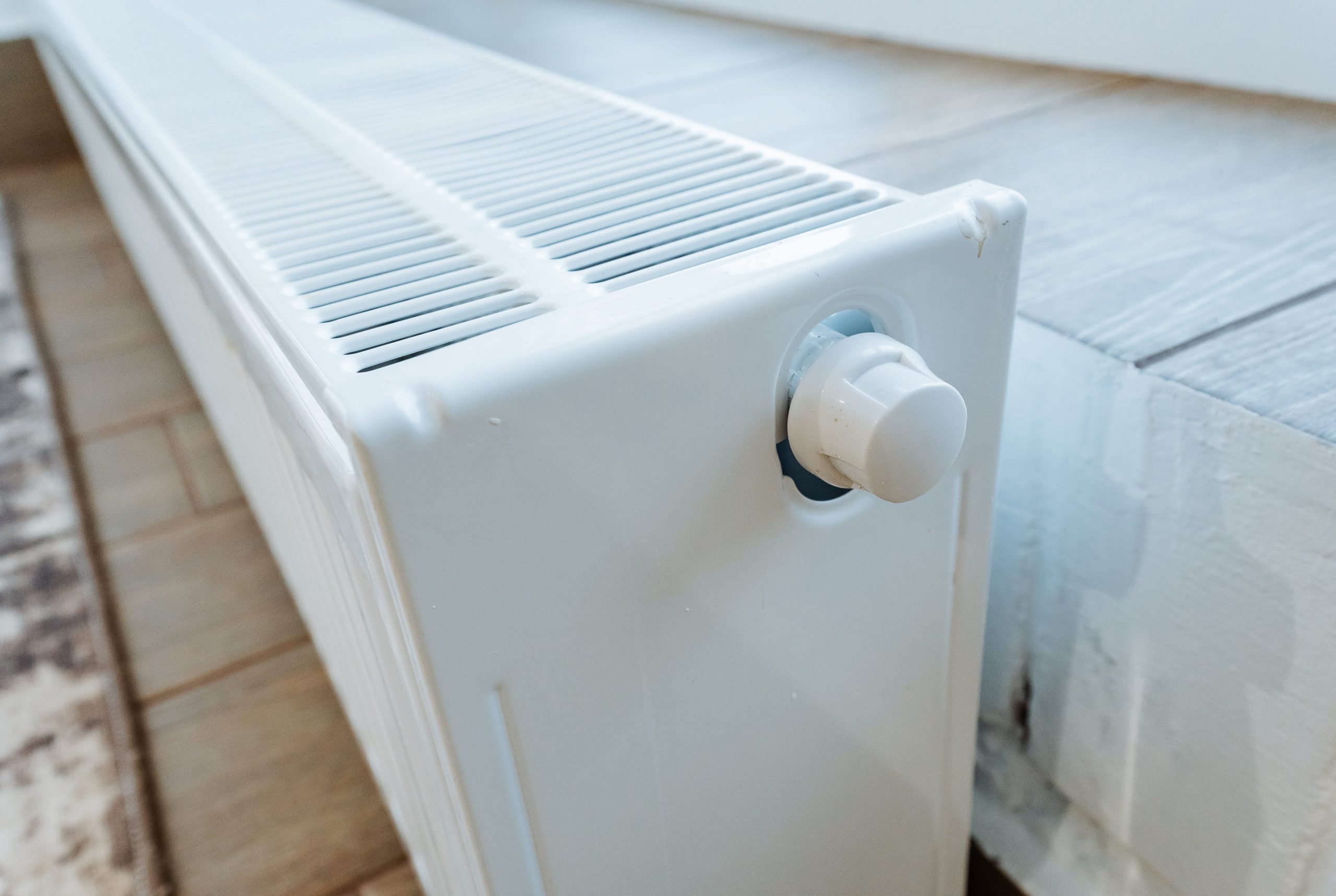 vecteezy_modern-white-radiator-with-controls-slim-radiator-featuring_74087134 (1)